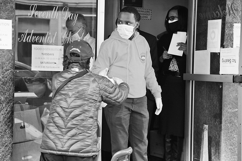 2020 : Food Lines : Seventh Day Adventists Help the Needy : Streetlife : New York City : Times Square : Richard Moore : Photographer : Photojournalist